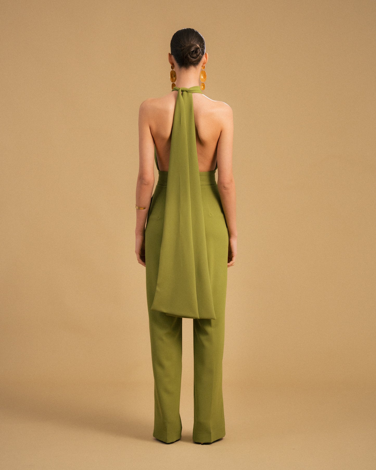 MACACÃO TIRAS CRUZADAS